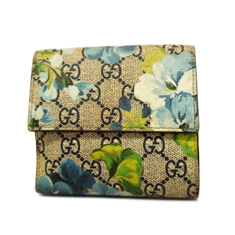 bnib gucci gg blooms bifold wallet|GG bifold card case in pale blue and brown canvas.